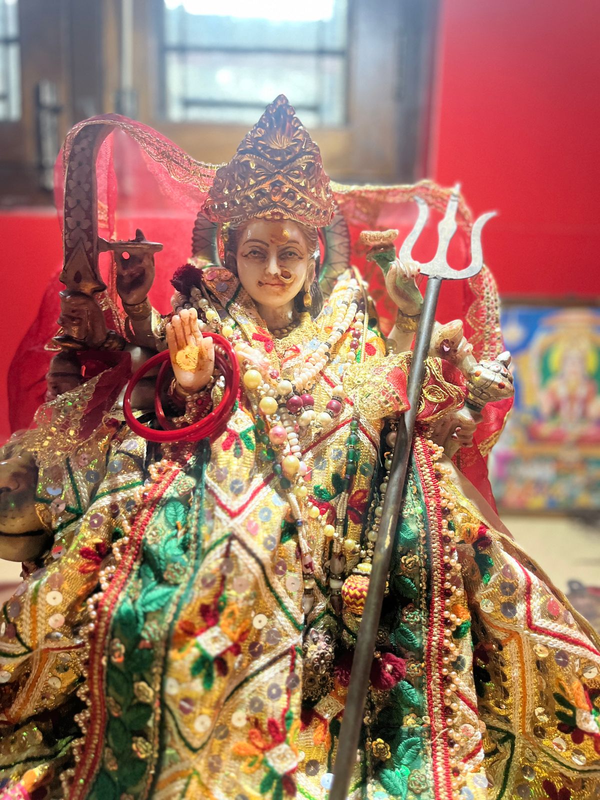 Devi with a trident and an ornate crown